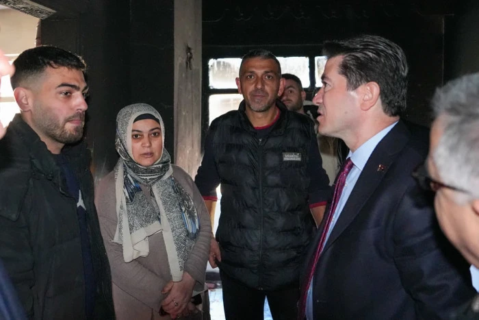 Ortahisar Belediye Başkanı Ahmet Kaya, yangında evi zarar g&ouml;ren aileyi ziyaret ederek destek s&ouml;z&uuml; verdi